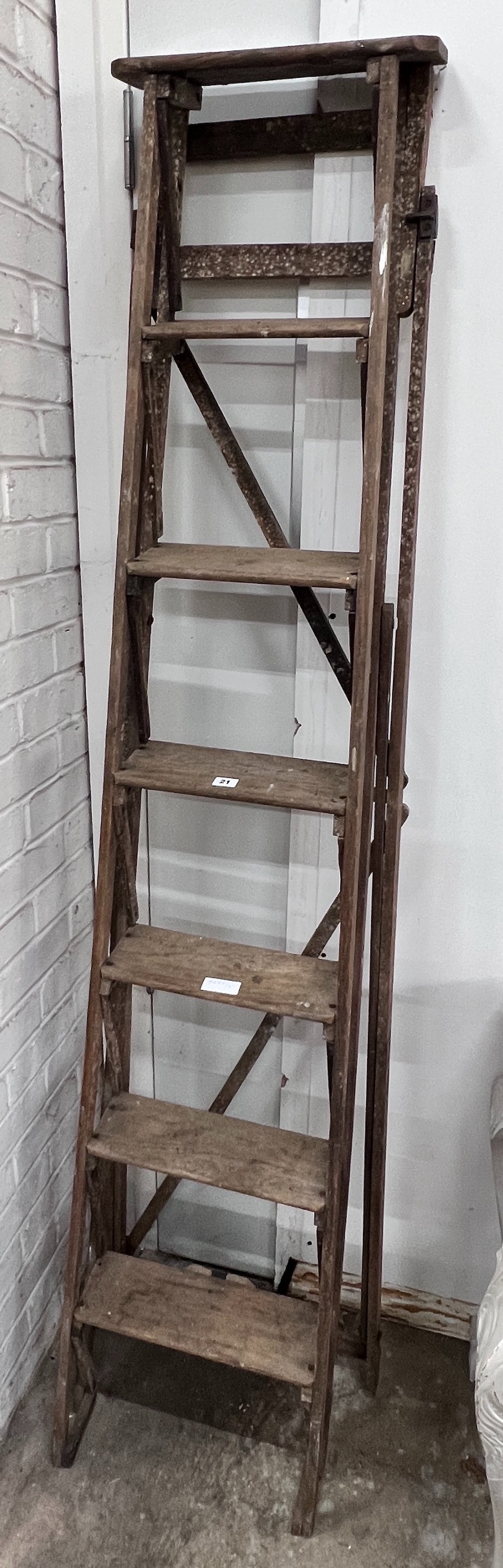 A vintage pine six tread step ladder, height 183cm *Please note the sale commences at 9am.